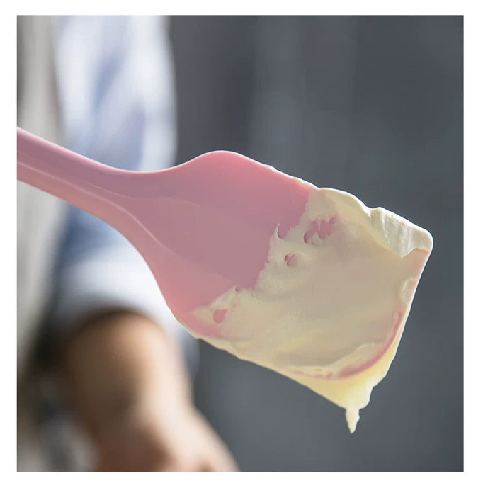 Pink CakeLand large silicone spatula lifting cream