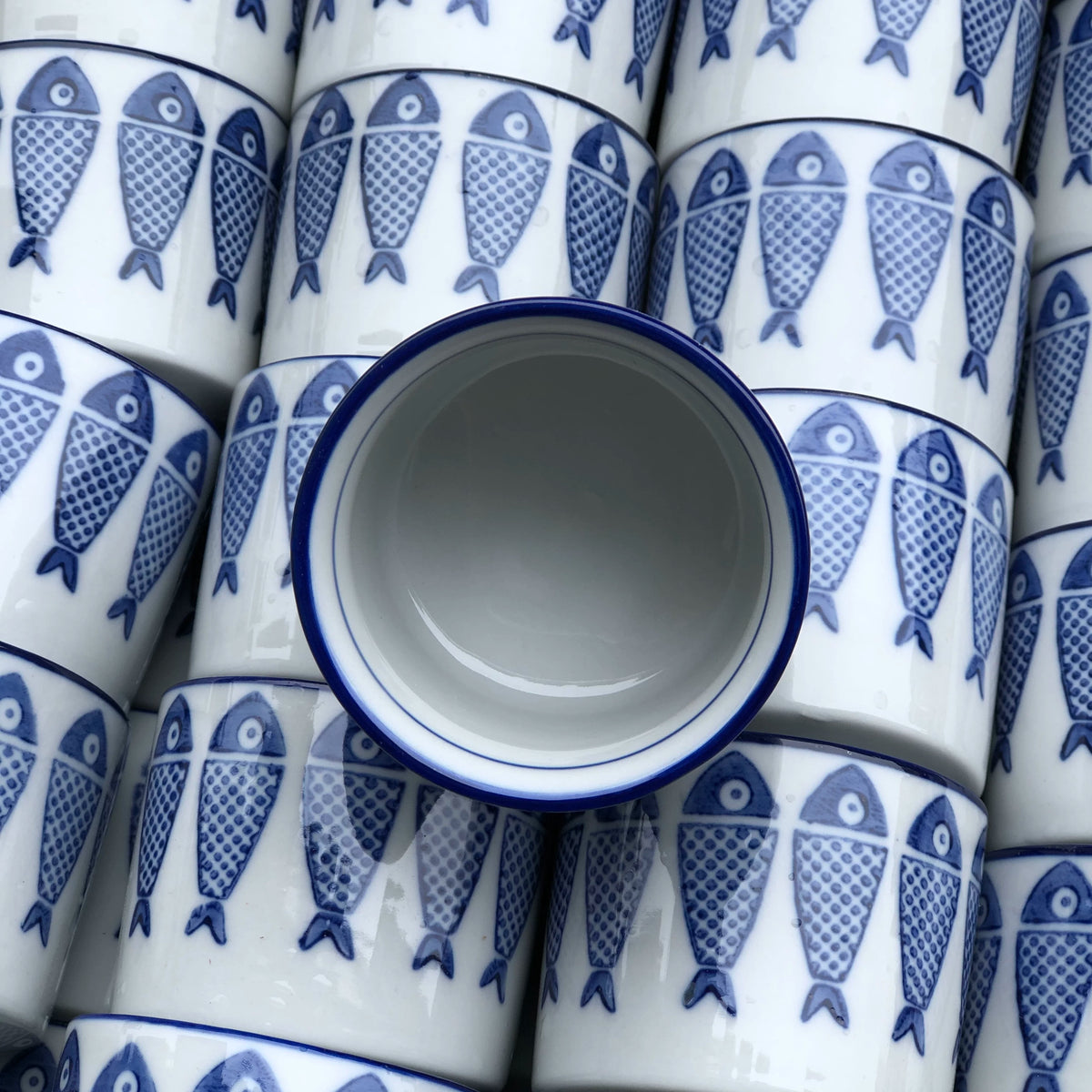 Traditional blue-and-white porcelain fish teacup detail