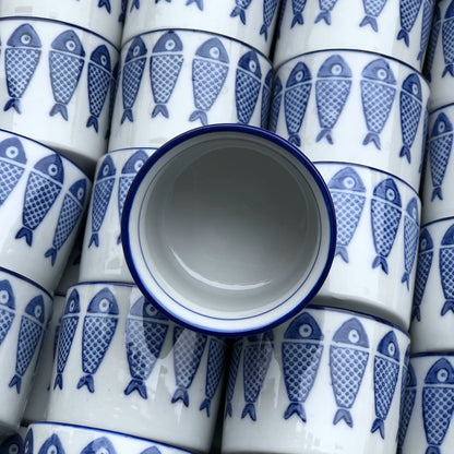 Traditional blue-and-white porcelain fish teacup detail