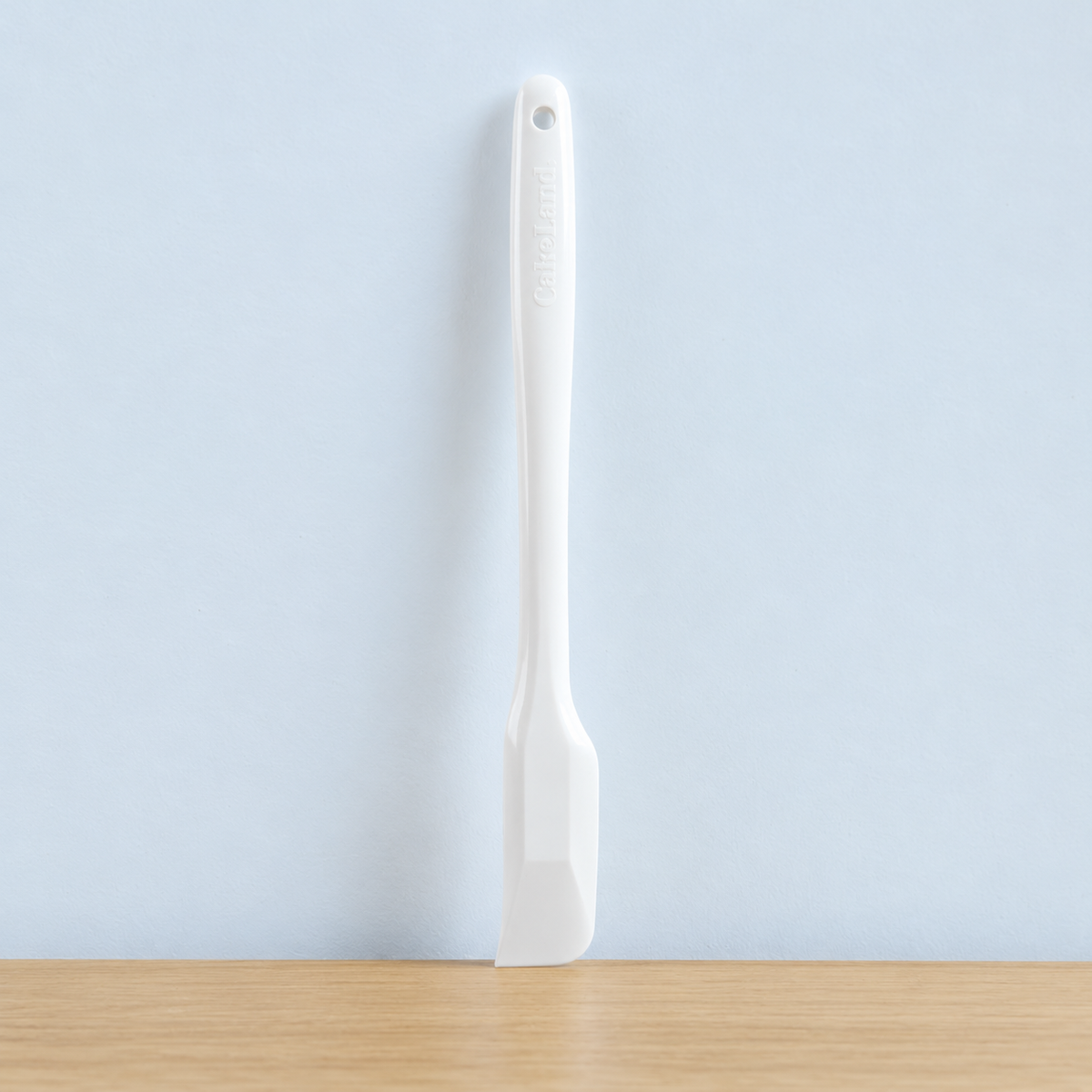 White TIGERCROWN CakeLand small silicone spatula, 25.7 cm
