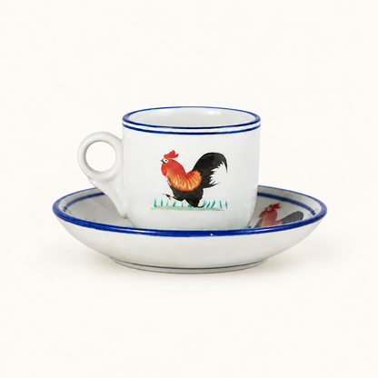 Small ceramic rooster coffee cup and matching saucer