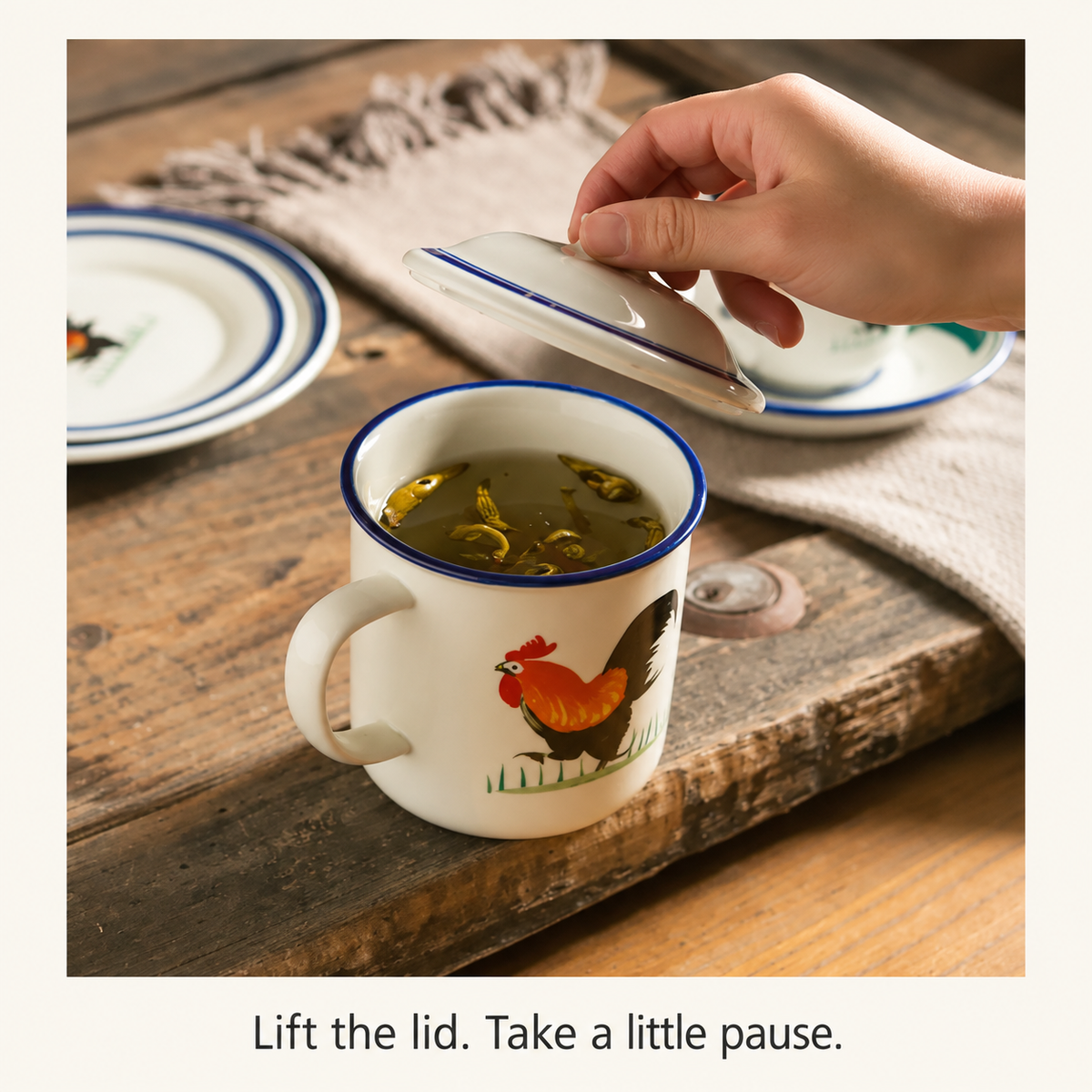 Lifting the ceramic lid from a rooster tea mug