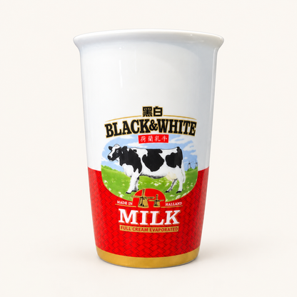Black & White ceramic milk tea cup on an ivory background